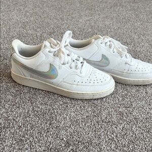 Nike White Sneakers with Holographic Silver Swoosh